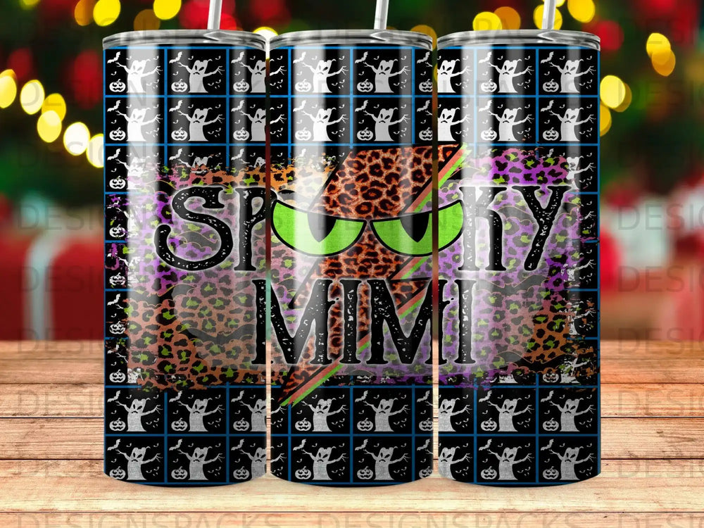 Tumbler with spooky Halloween pattern and "Spooky Mimi" text.