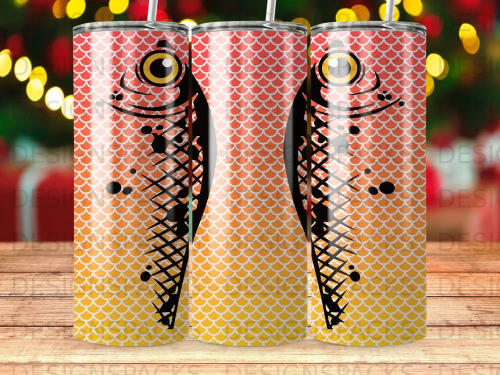 Fish pattern tumbler with orange scales and black fins.