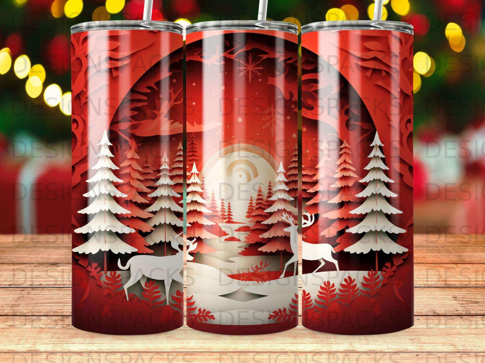 Red tumbler with white silhouette forest scene and deer.