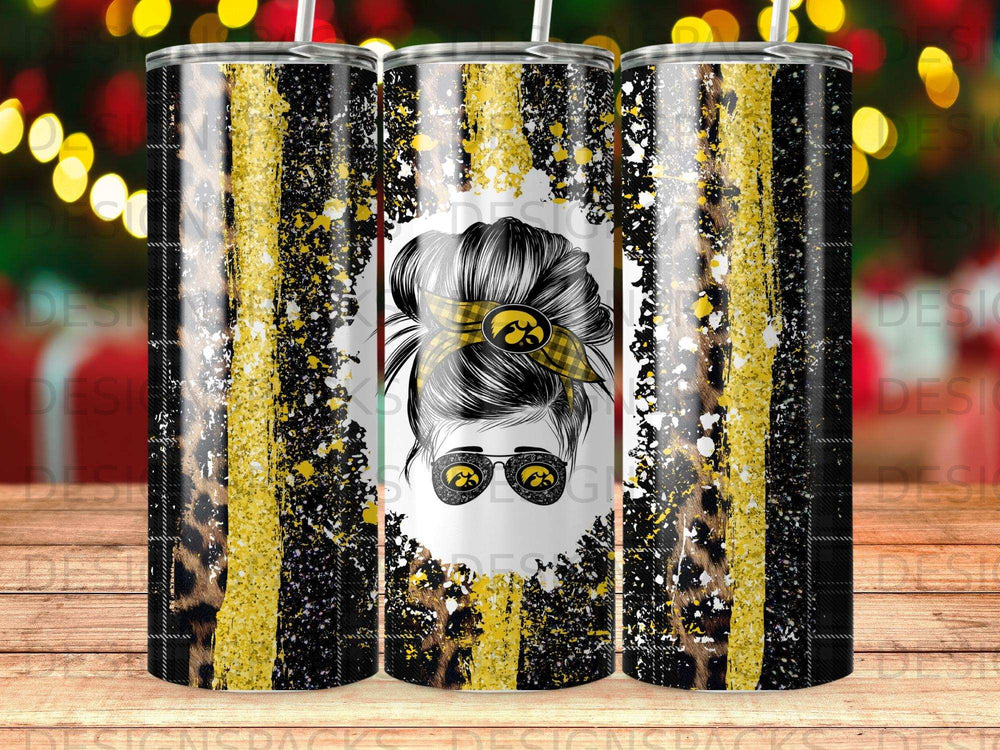 Tumbler with Iowa Hawkeyes logo, messy bun, and leopard print design.