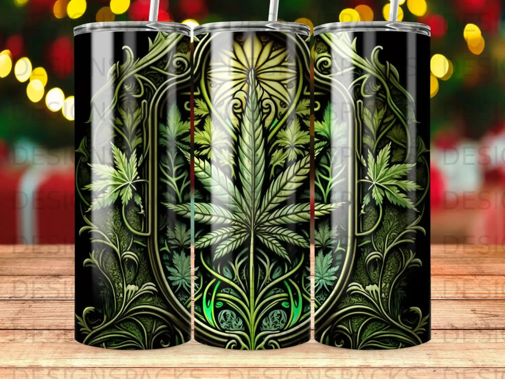 Green cannabis leaf design on a black tumbler with ornate gold accents.