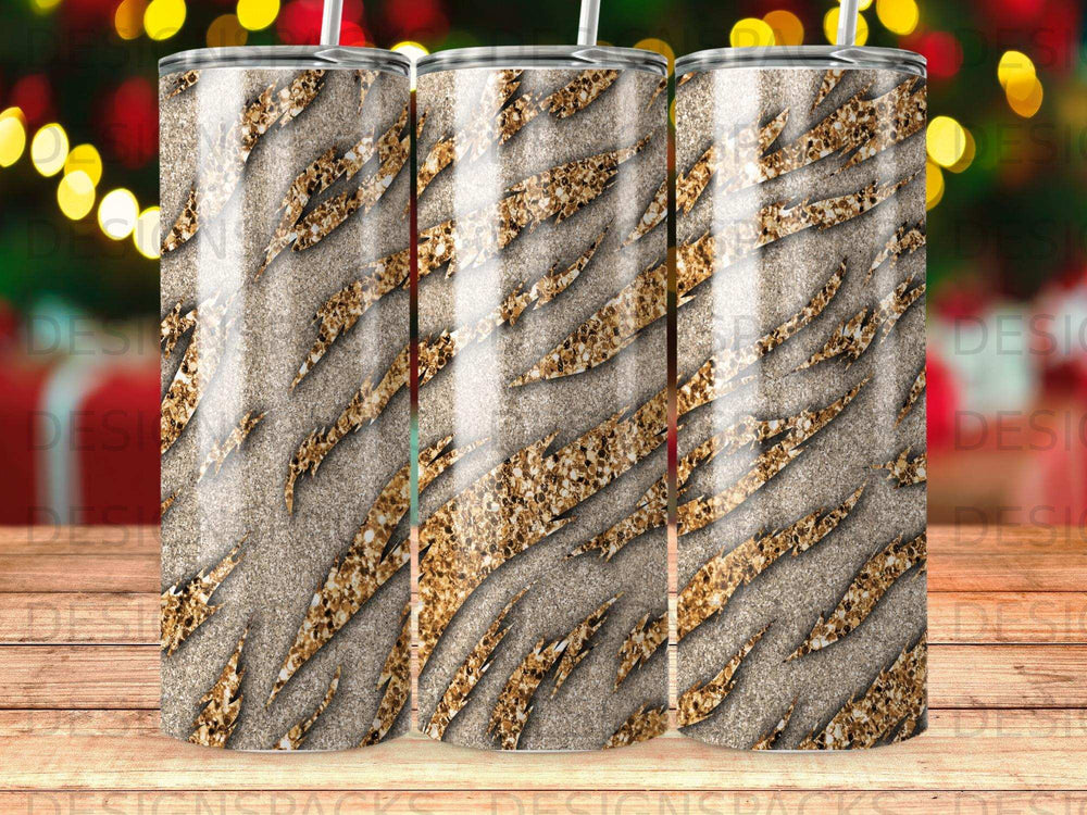 Tapered tumbler with a gold glitter tiger stripe pattern on a textured background.