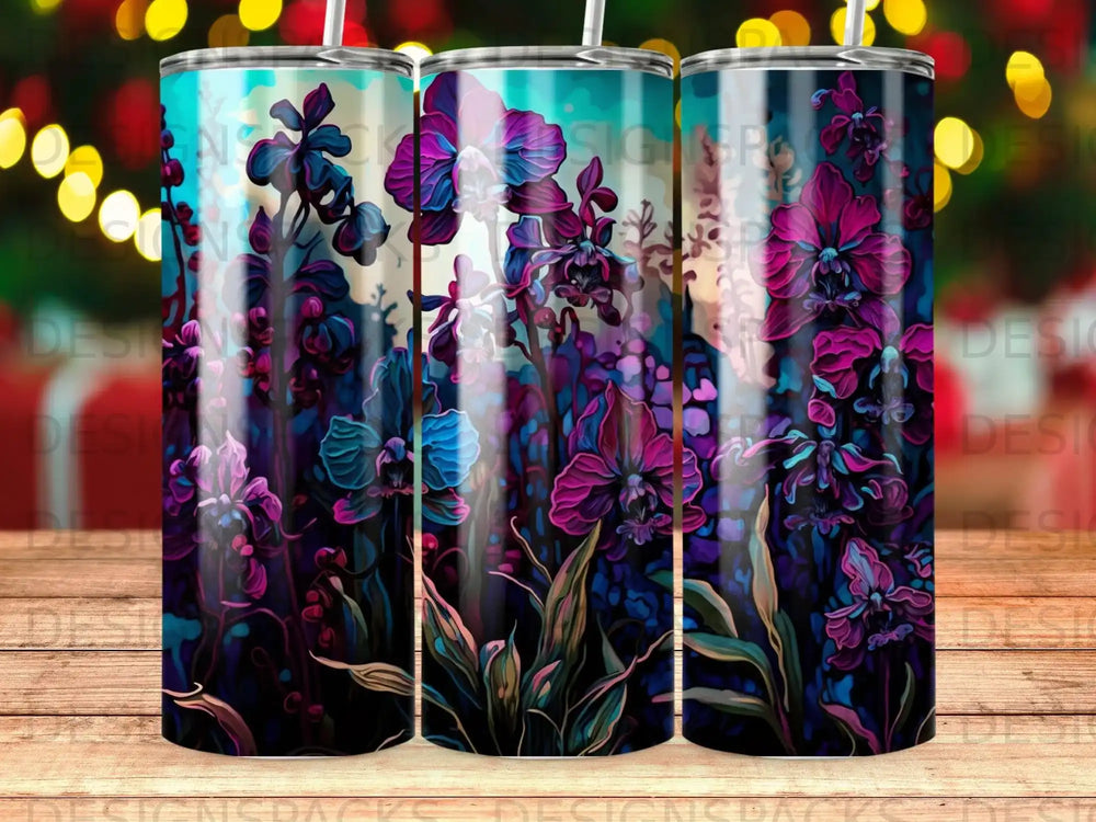 Floral pattern with purple and blue orchids and green leaves on a tumbler.