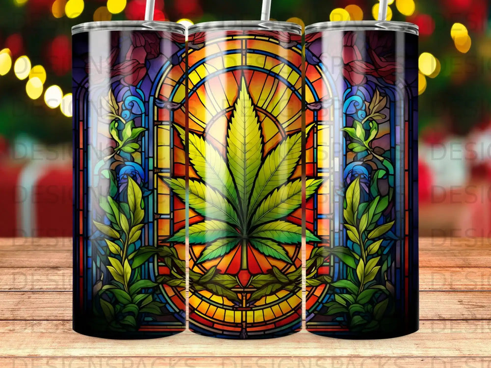 Stained glass tumbler with cannabis leaf and floral accents.