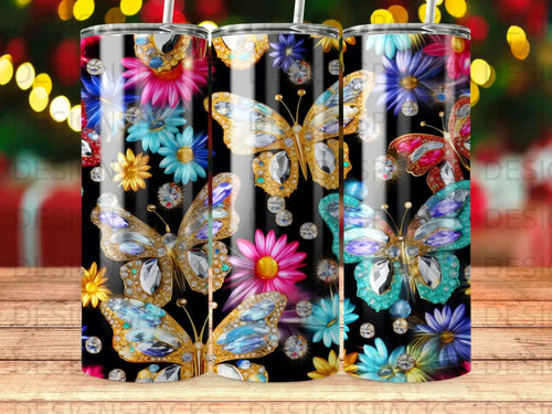 Black tumbler with sparkling butterflies and colorful flowers.