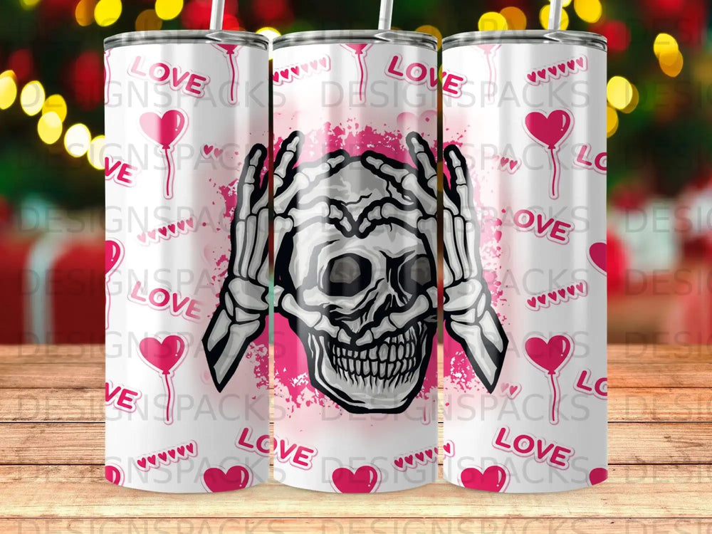 Skeleton hands covering eyes with pink skull and hearts, on a tumbler.