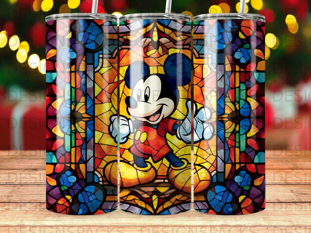 Mickey Mouse stained glass tumbler with colorful patterns and bokeh background.
