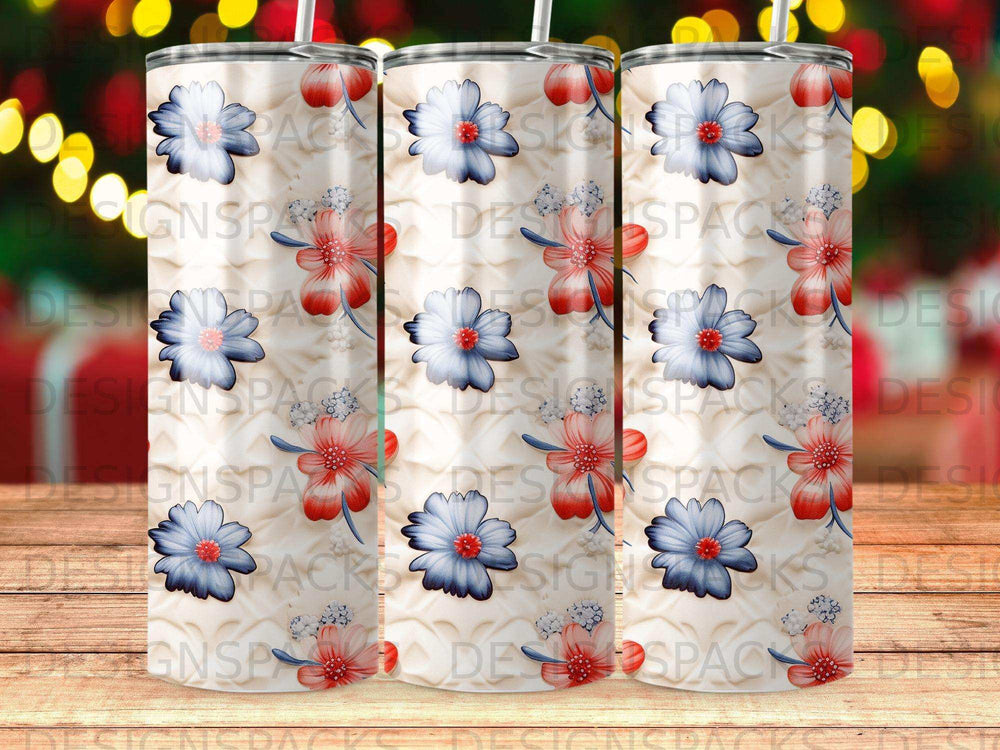 Three tumblers with a red, white, and blue floral pattern on a textured background.