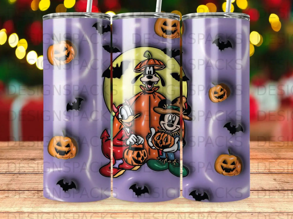 Disney characters Donald Duck, Mickey Mouse, and Goofy in Halloween costumes.