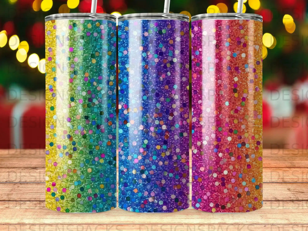 Three glitter tumblers with rainbow, blue, and pink designs.