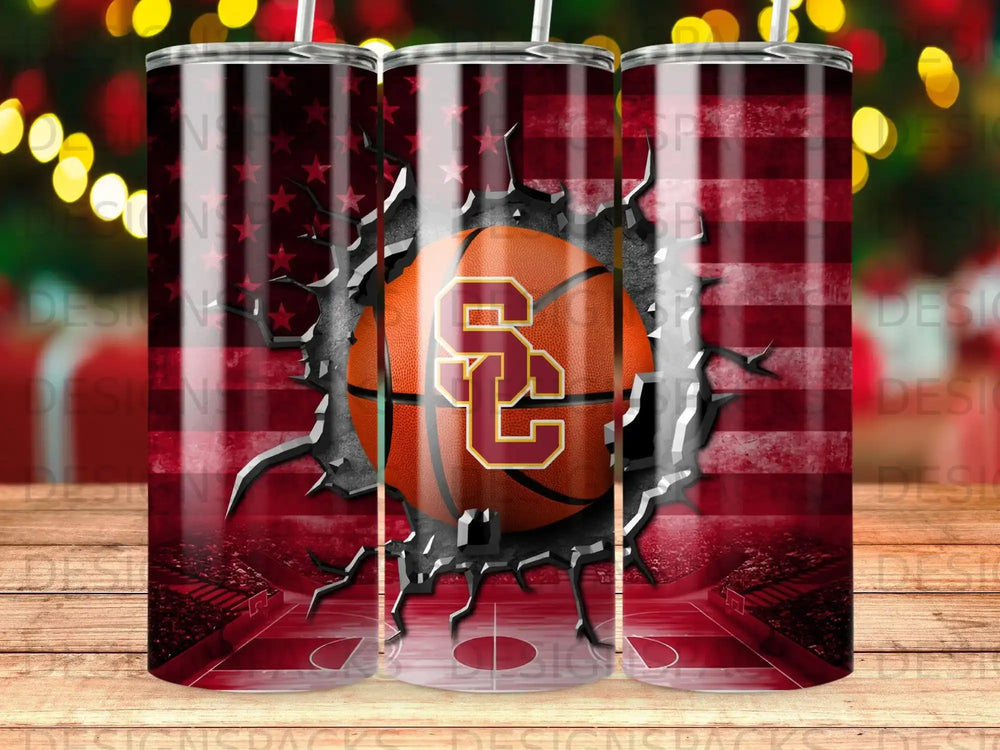 Basketball with USC logo breaking through American flag texture.