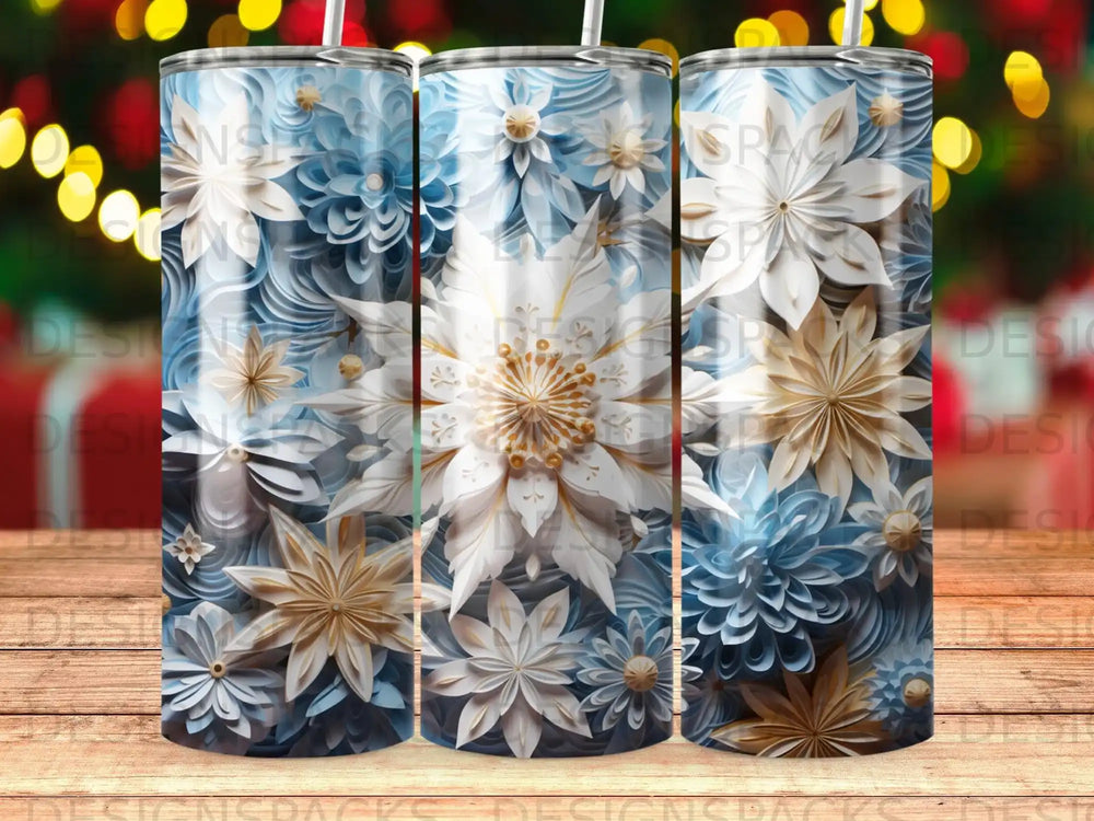 Three tumblers with white and blue floral designs, set against a bokeh background.