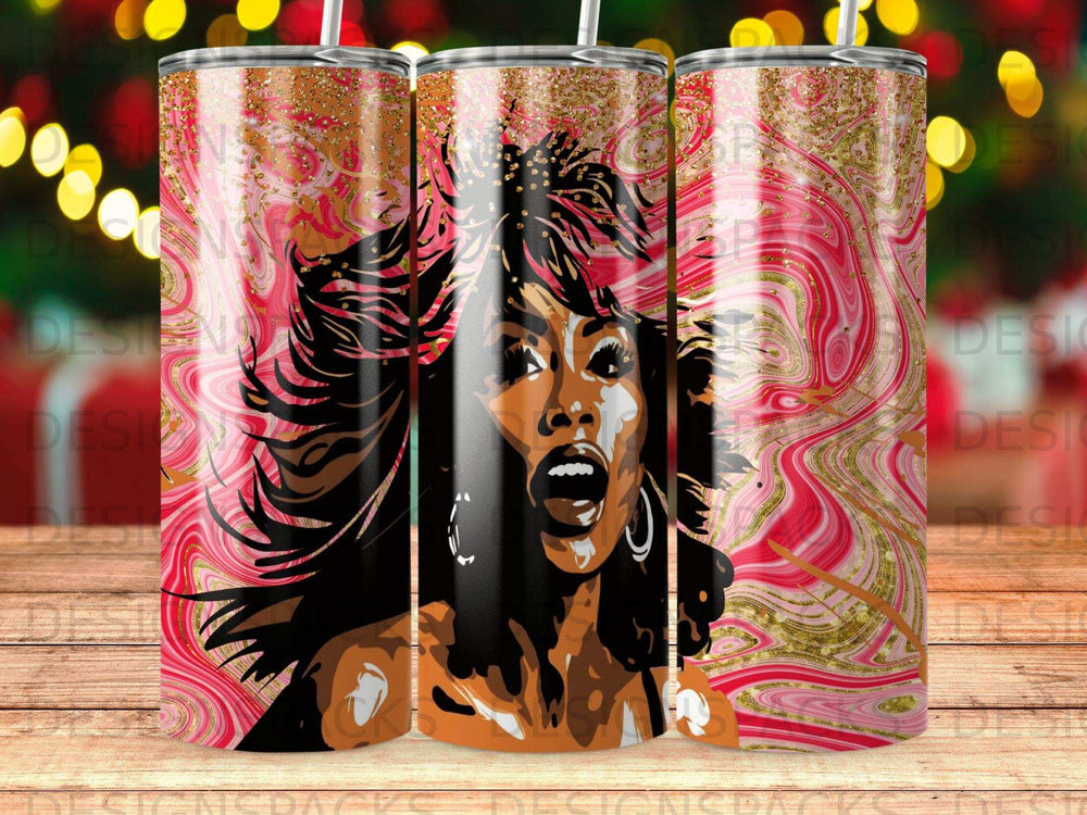 Tumbler with abstract pink and gold marbling and a woman's face.