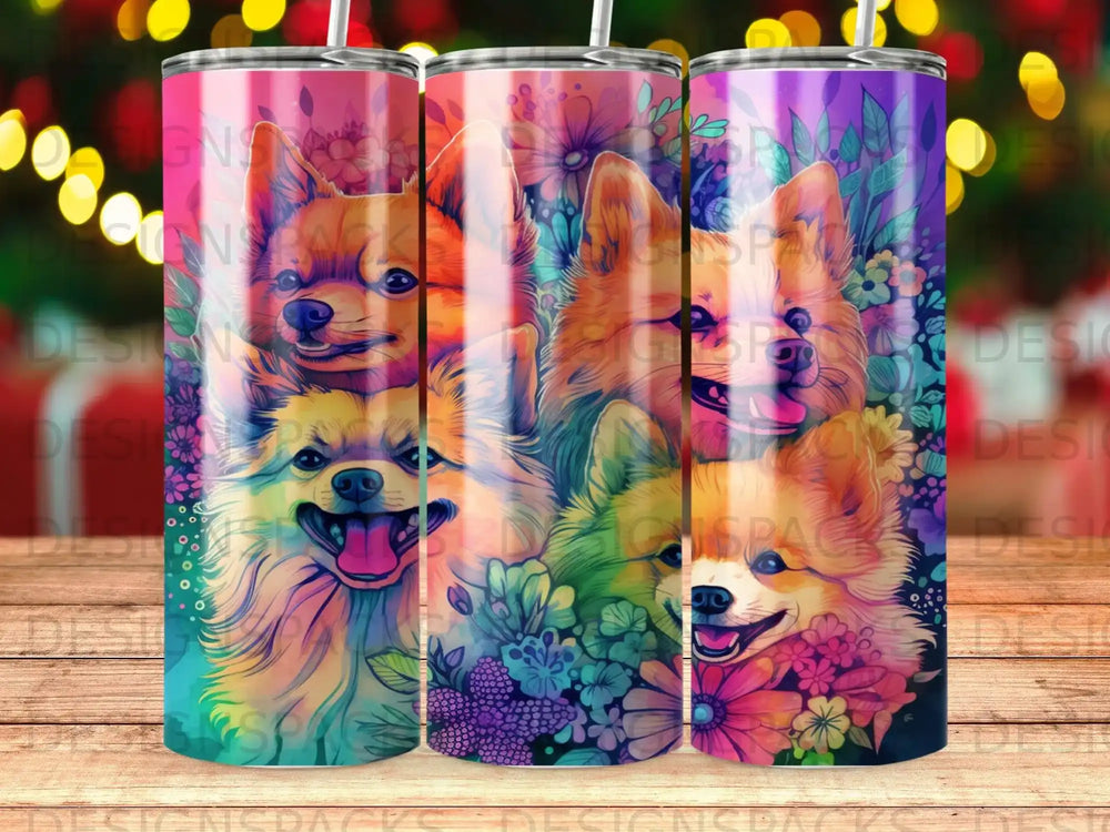 Four happy dogs with colorful floral background on a skinny tumbler.
