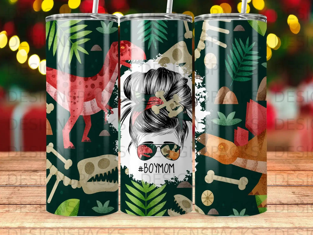 Green tumbler with dinosaur bones, leaves, and "#BOYMOM" text.