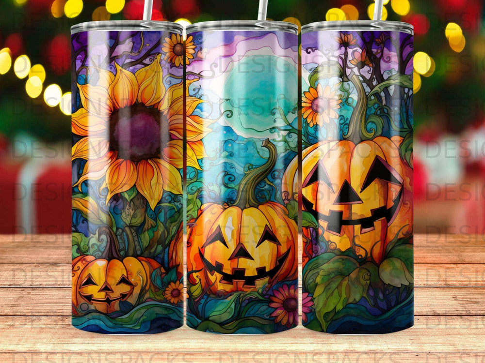 Halloween tumbler with pumpkins, sunflowers, and moon.