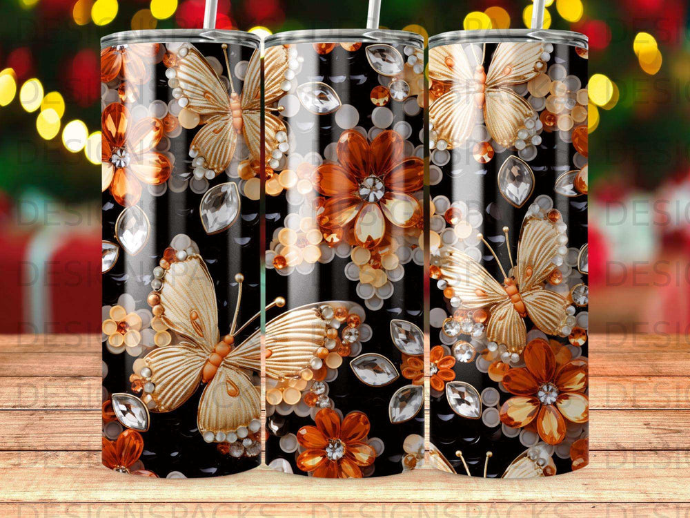 Gold butterflies and amber flowers on a black tumbler with crystal accents.