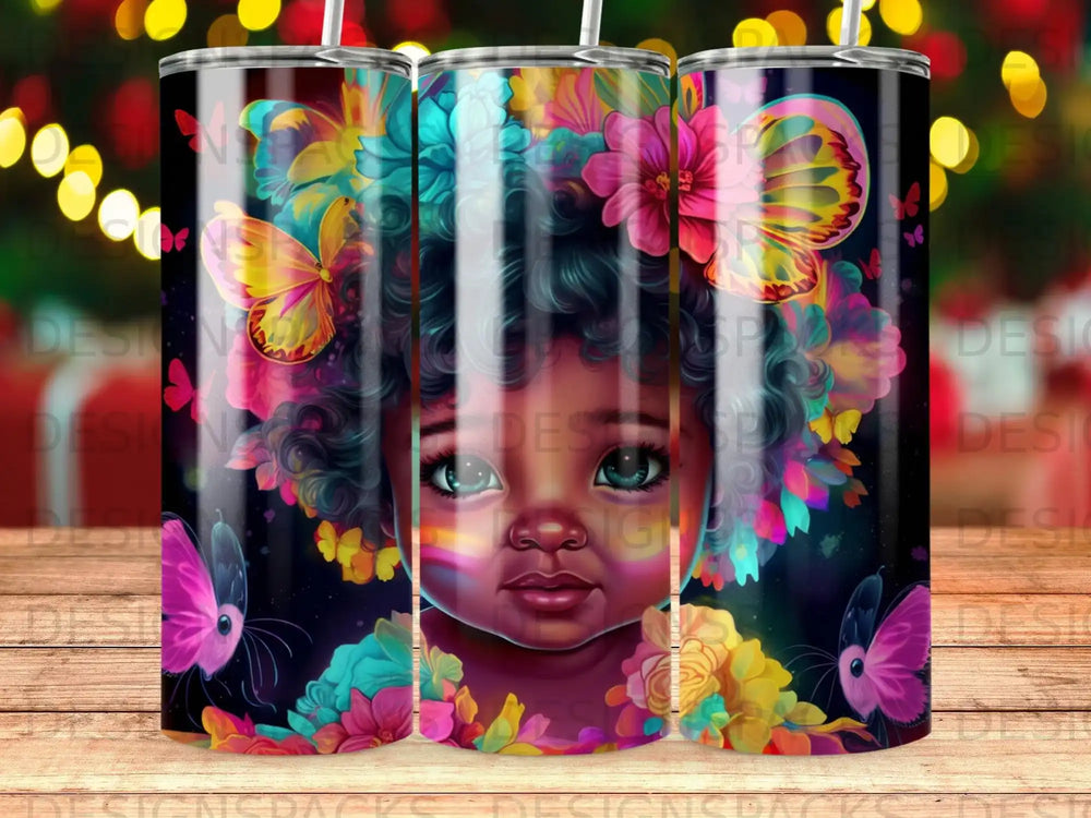 Tumbler featuring a Black child's face surrounded by colorful flowers and butterflies.