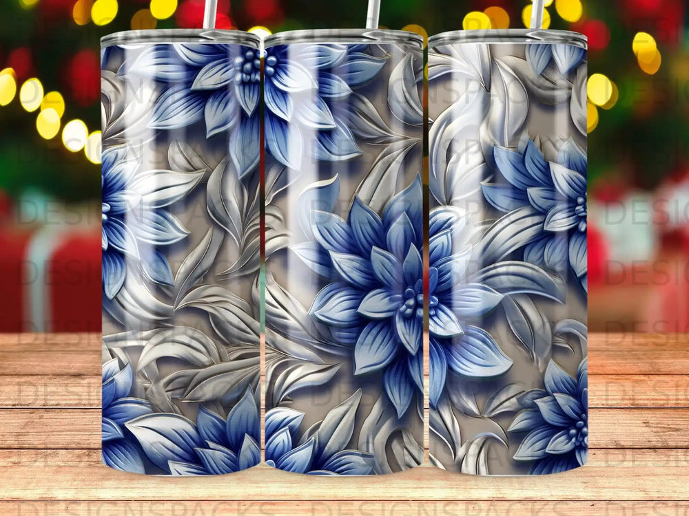 Floral pattern with blue flowers and silver leaves on a tumbler.