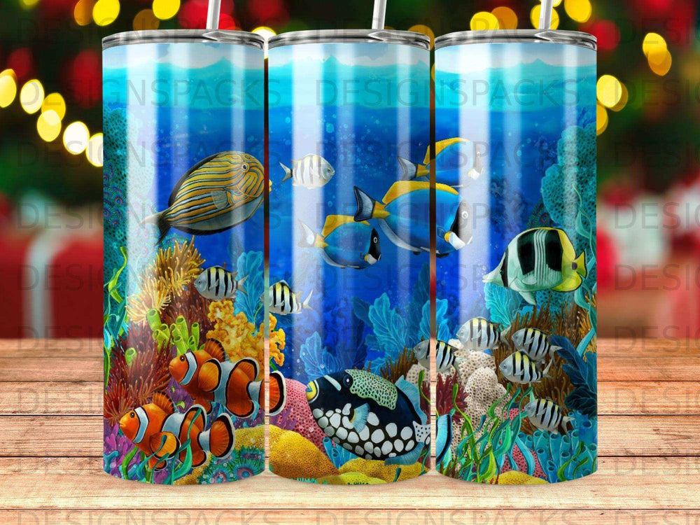 Coral reef with various fish including clownfish and angelfish, on a tumbler.