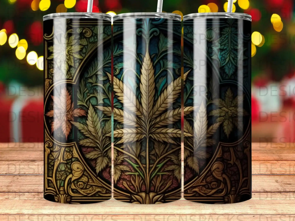 Cannabis leaf pattern on a cylindrical tumbler with a dark, ornate background.