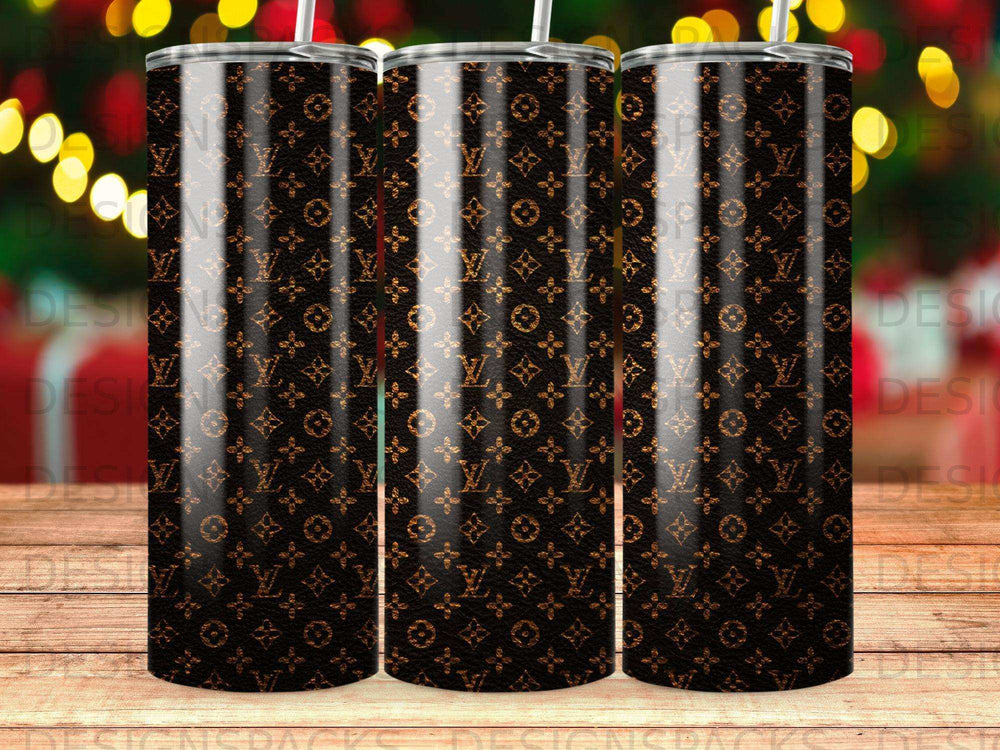 Three tumblers with a repeating Louis Vuitton-inspired monogram pattern.