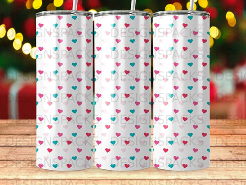 Three tumblers with a scattered pink and blue heart pattern.
