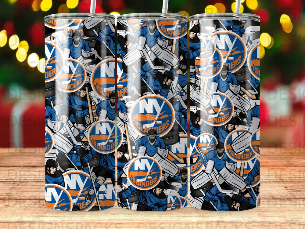New York Islanders hockey team pattern on three tumblers with blurred festive lights.