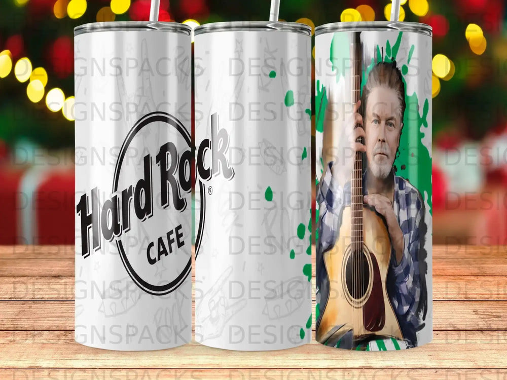Hard Rock Cafe tumbler with a man playing guitar in front of a green background.