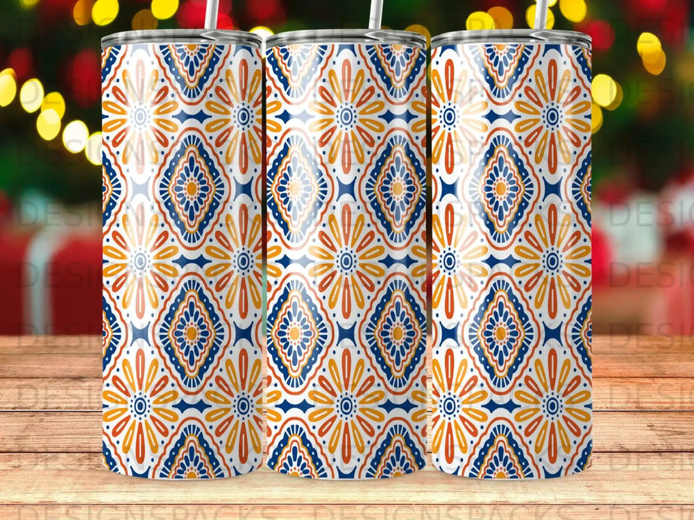 Three tumblers with a blue, orange, and yellow floral mosaic pattern.