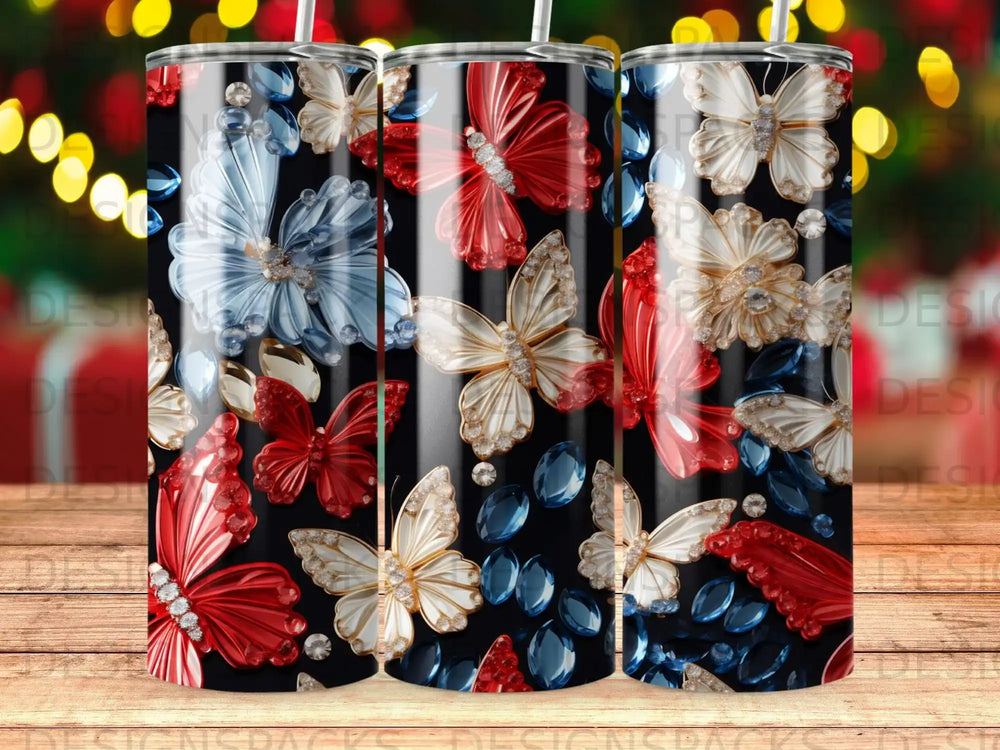 Tumbler with red, white, and blue butterflies and gems on black background.