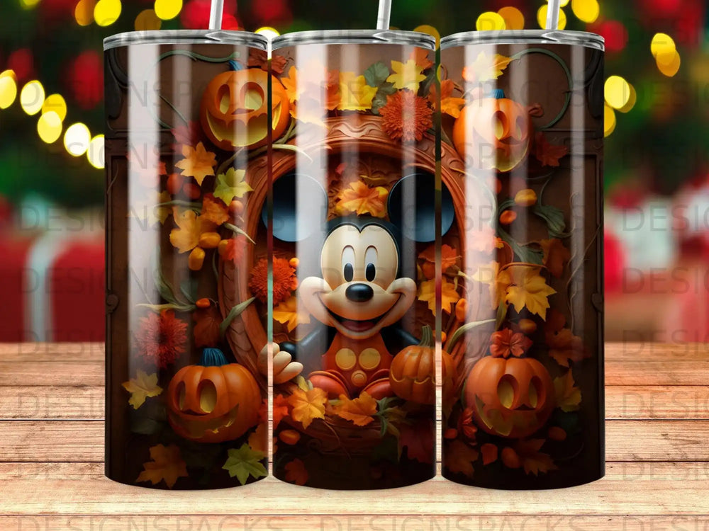 Mickey Mouse in autumn leaves and pumpkins on a tumbler.
