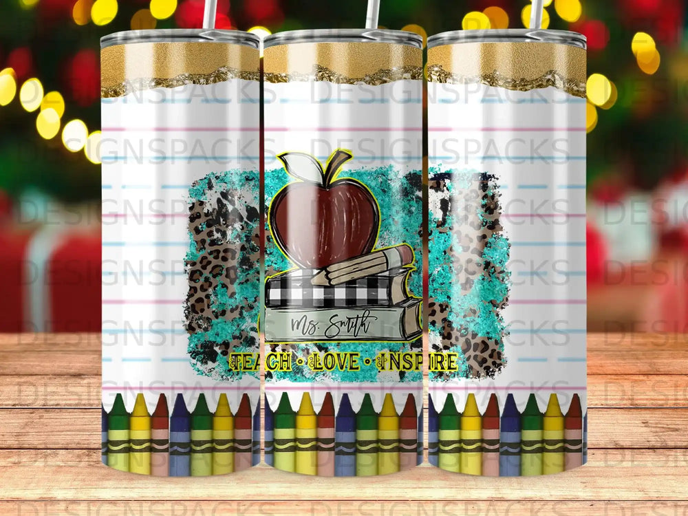 Tumbler with apple, books, crayons, and text "Ms. Smith Teach Love Inspire".