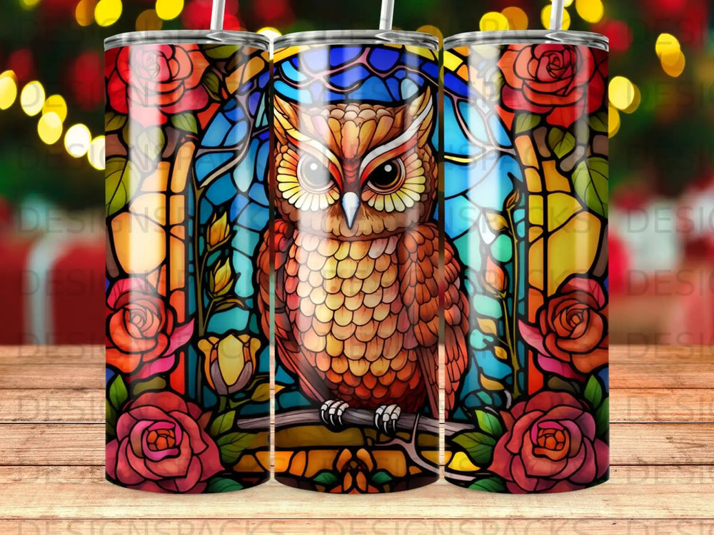 Stained glass owl with roses, warm light background.