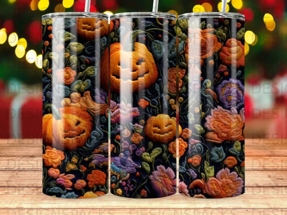 Three tumblers with a spooky Halloween pumpkin floral pattern.
