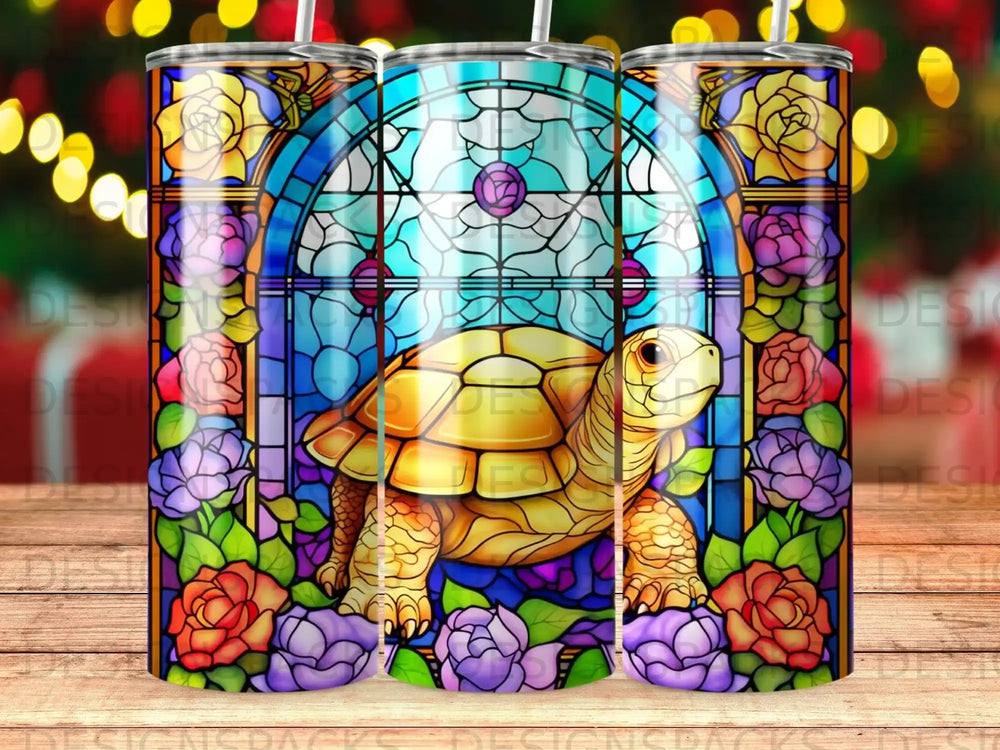 Stained glass turtle surrounded by colorful flowers and ornate borders.