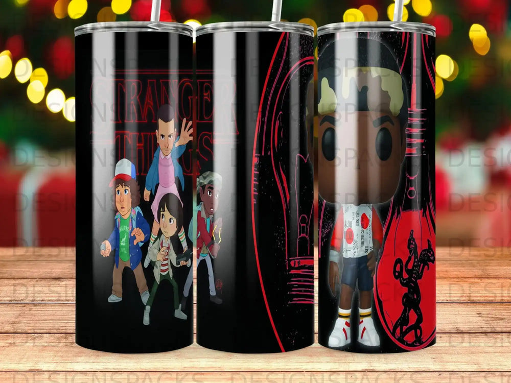 Stranger Things characters and Japanese text on a black tumbler.