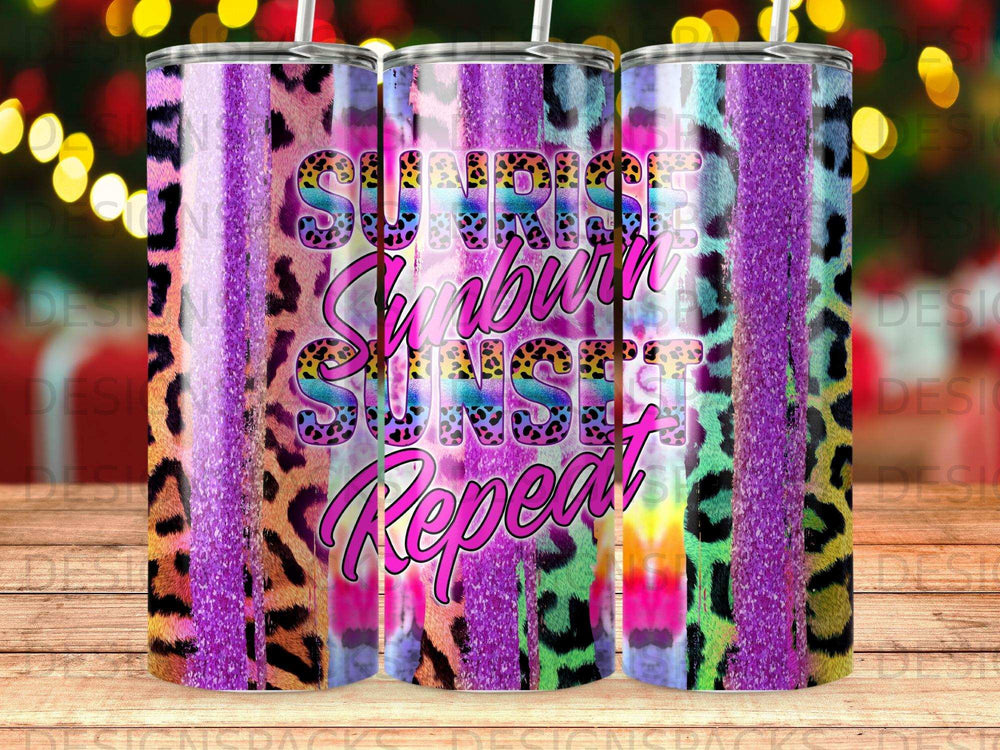 Tumbler with leopard print and colorful "Sunrise Sunset Repeat" text.