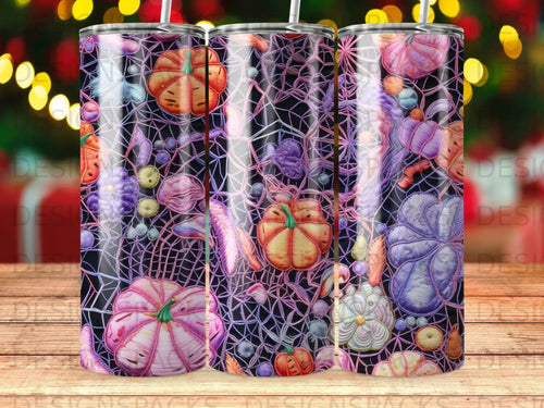 Tumbler with Halloween theme: pumpkins, spiderwebs, feathers, and fall leaves.