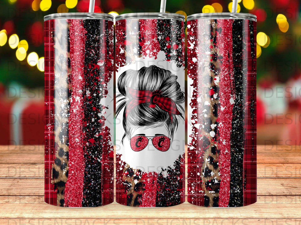 Red, black, and leopard print tumbler with messy bun graphic.