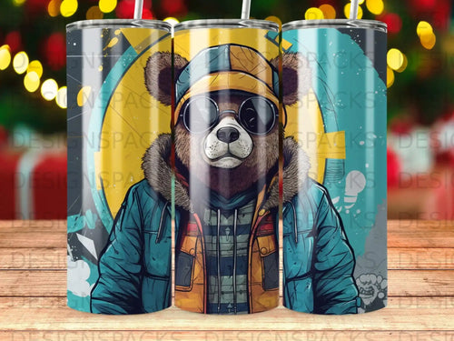 Bear wearing sunglasses and a jacket, centered on a patterned tumbler.