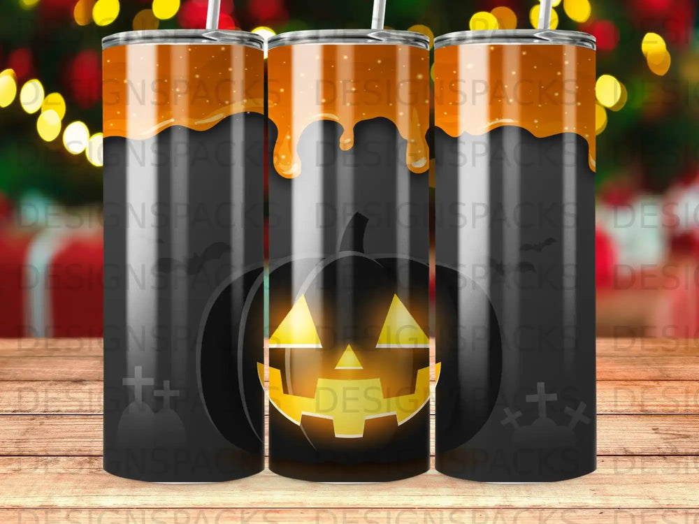 Three Halloween tumblers with a jack-o'-lantern design and orange dripping accents.