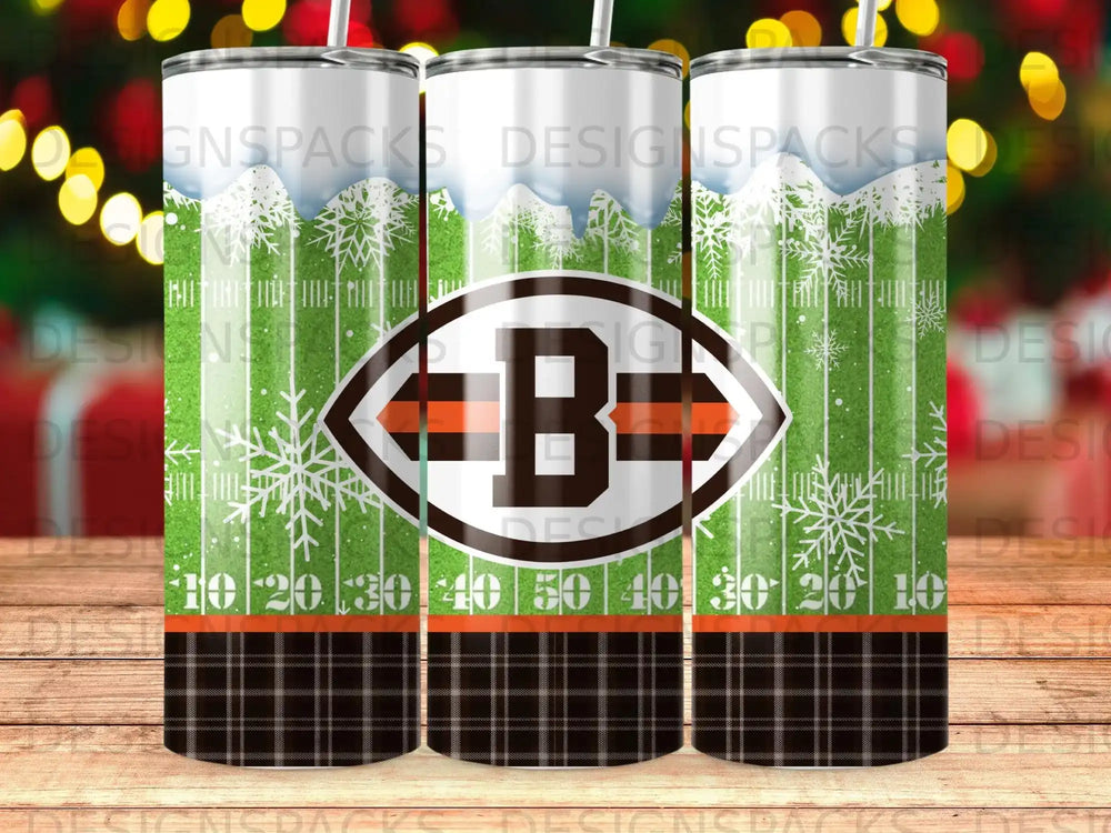 Brown and orange plaid football tumbler with snowflakes.