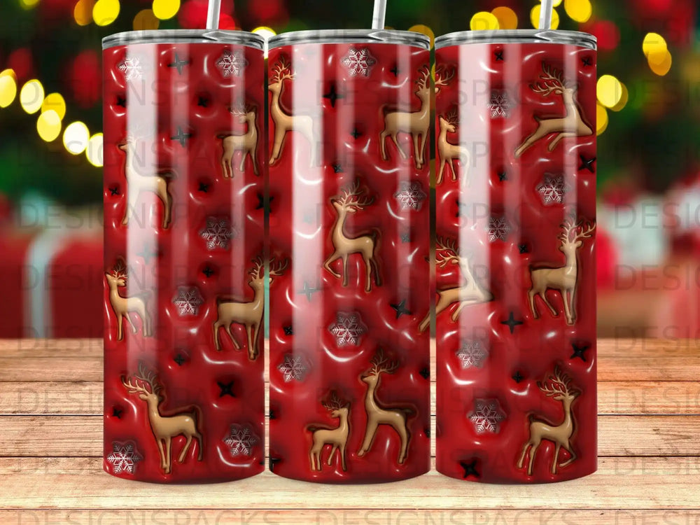 Red tumbler with gold reindeer and snowflake pattern.