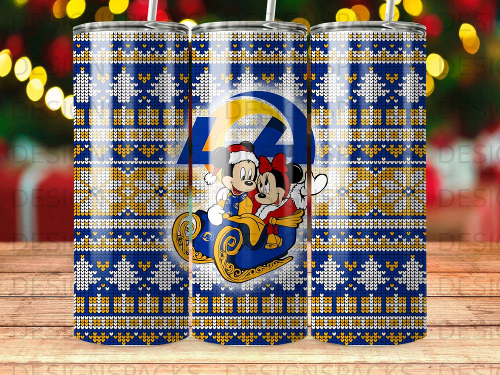 Mickey and Minnie Mouse in a sleigh on a blue, gold, and white snowflake and Christmas sweater pattern tumbler.