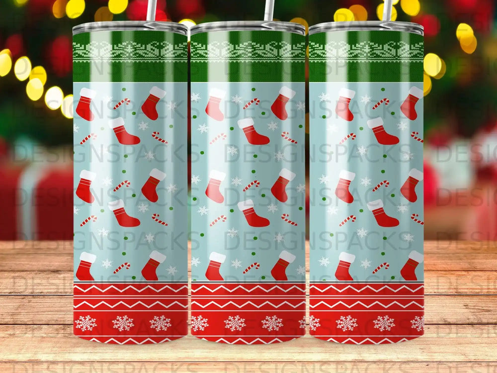 Christmas pattern tumbler with candy canes, stockings, and snowflakes.