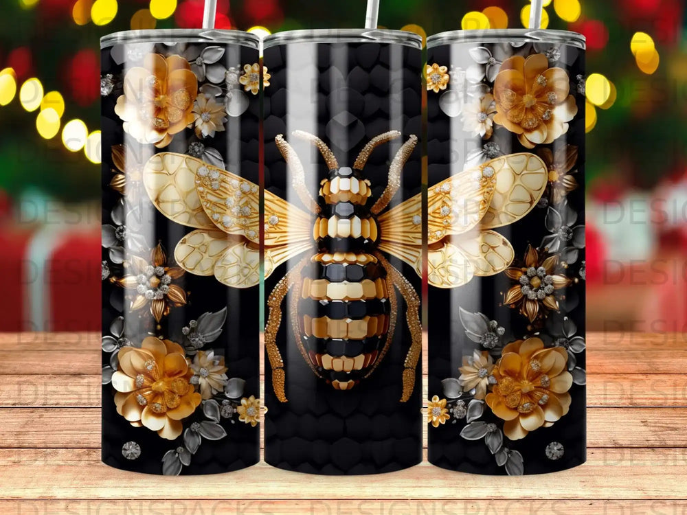 Black tumbler with gold and grey bee and floral accents.