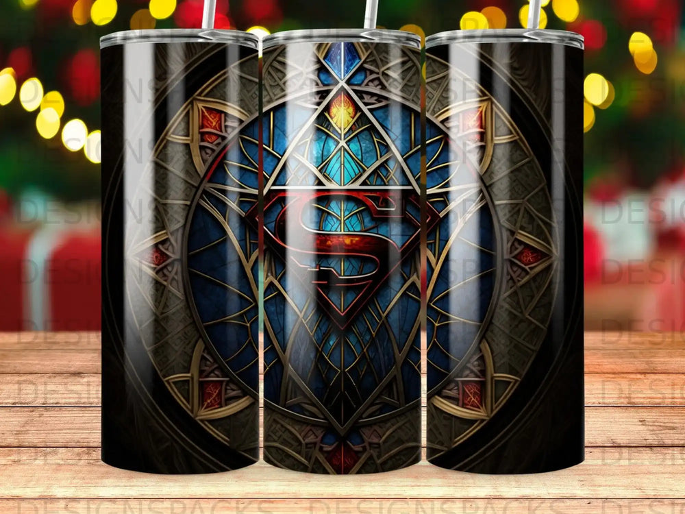 Superman logo on a stained glass-style tumbler with bokeh background.
