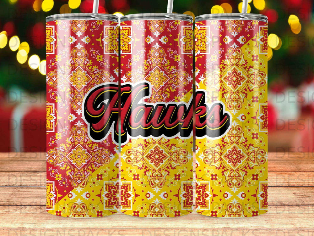 Three tumblers with a red, yellow, and black bandana-style pattern and "Hawks" text.