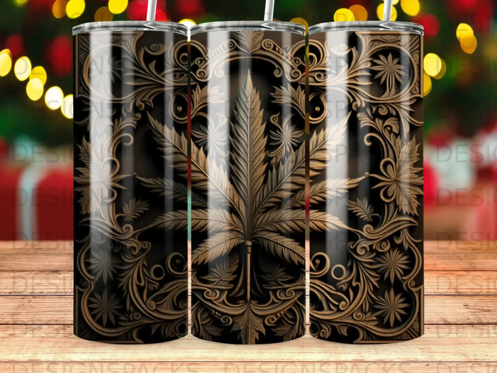 Gold ornate cannabis leaf pattern on a dark tumbler.